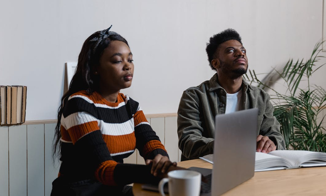Students using laptops in a classroom