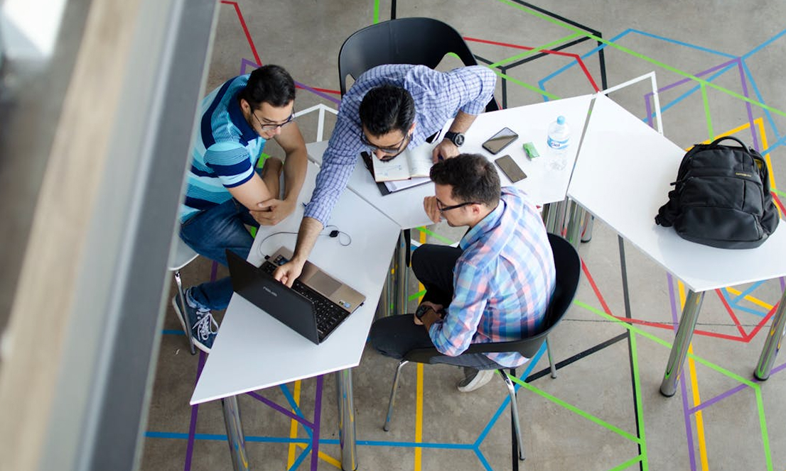 Students collaborating around a table